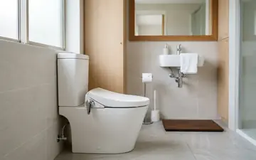 Bồn cầu nắp rửa lạnh INAX